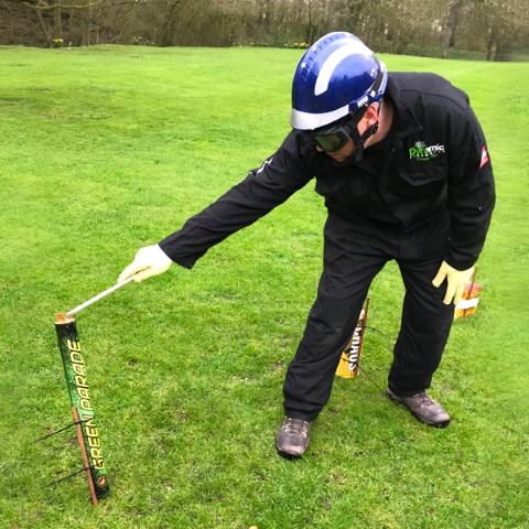 Ensuring no part of your body is over the firework, standing sideways, at arm's length light the outermost end of the fuse and retire immediately to the stated distance on the firework label.